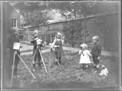 Kinderen spelen fotograaf