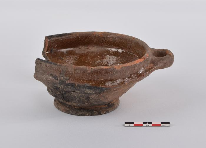 Papkom in roodbakkend aardewerk